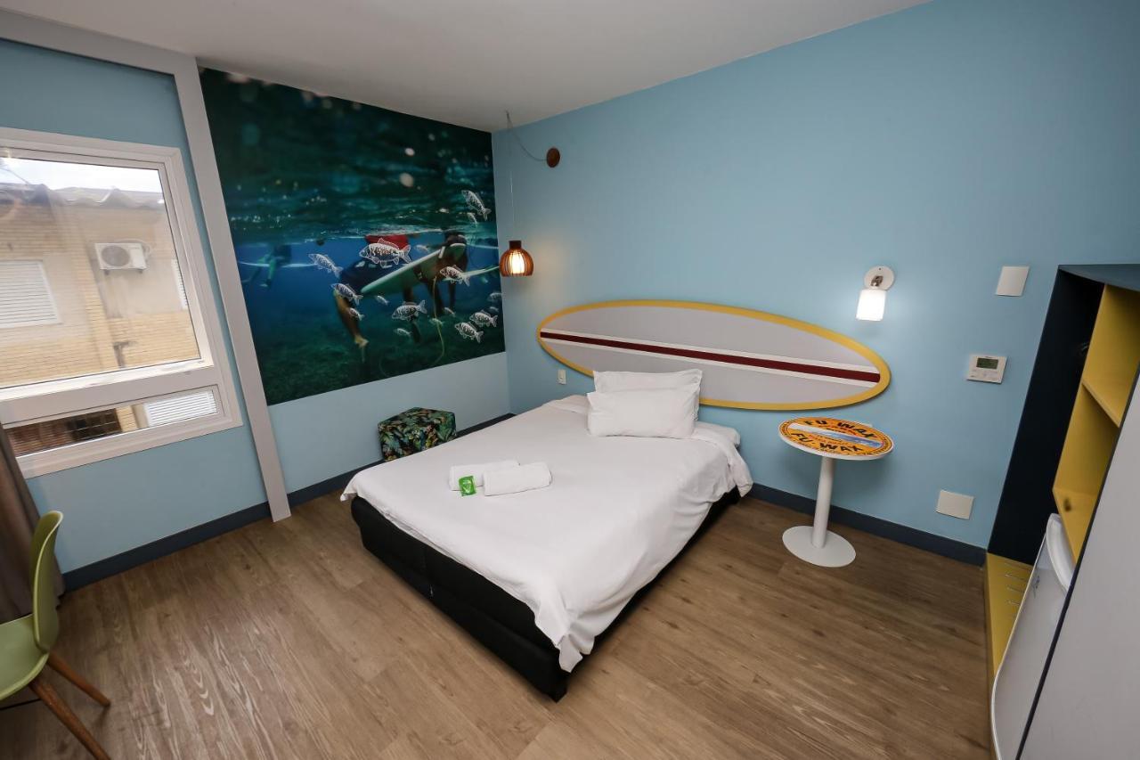 Delphin Surf Hotel Гуаружа Экстерьер фото